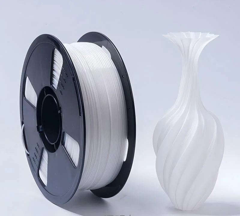 White PLA filament spool with printed vase sample